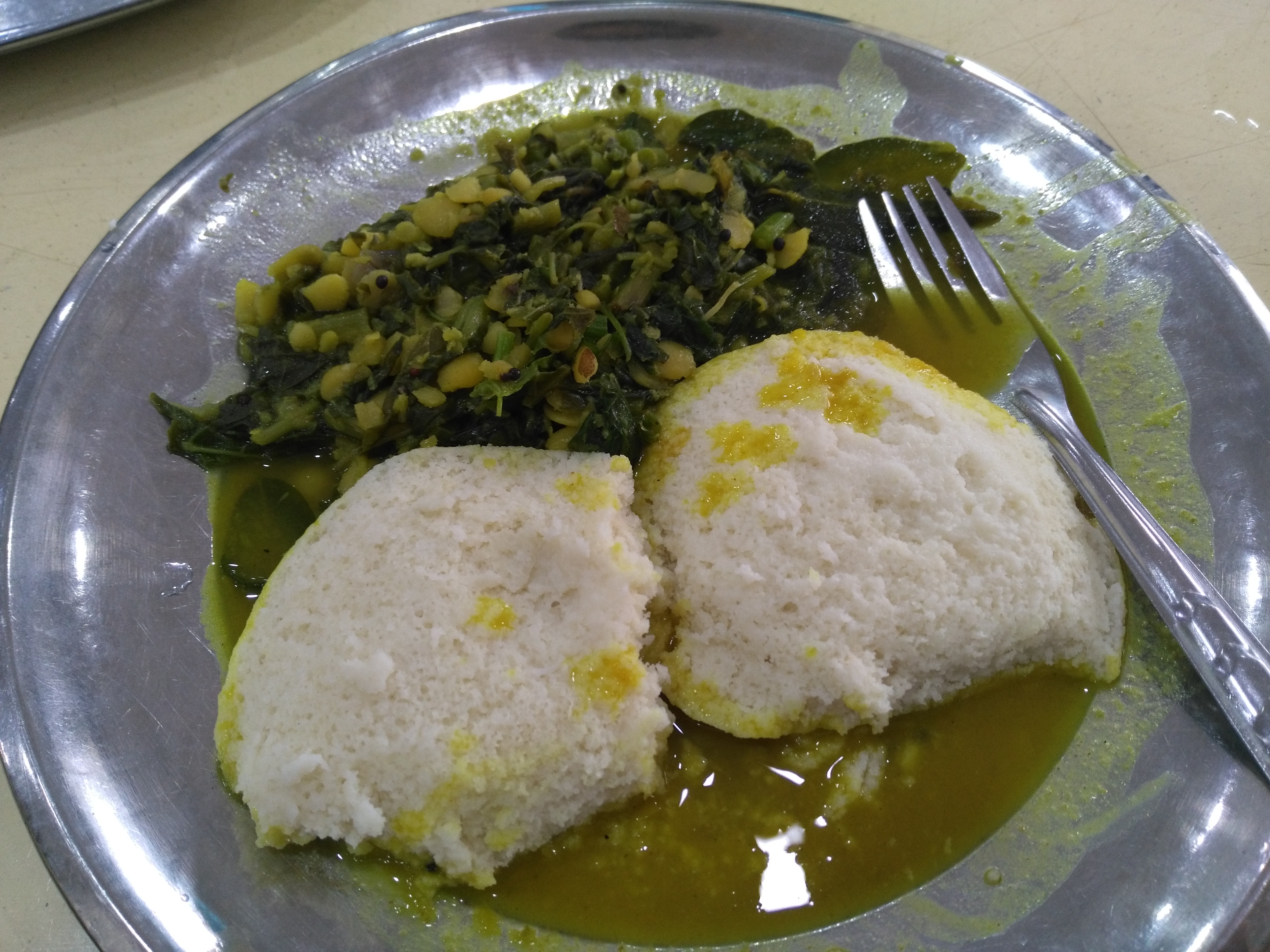 Idli and spinach/dal side dish.