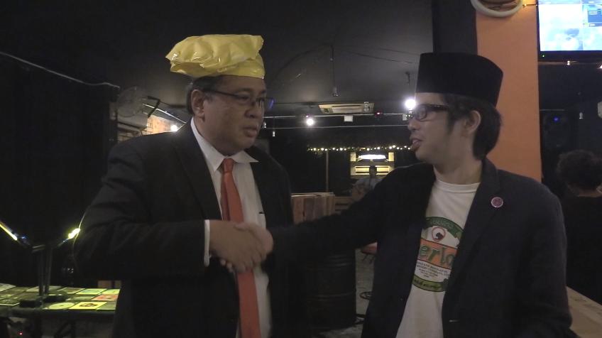 The Panda Heady Curry lead singer dressed up as Donald Trump and guitarist/backup vocalist for both Panda Head Curry and ROARM dressed up as a vaguely religious person shaking hands.