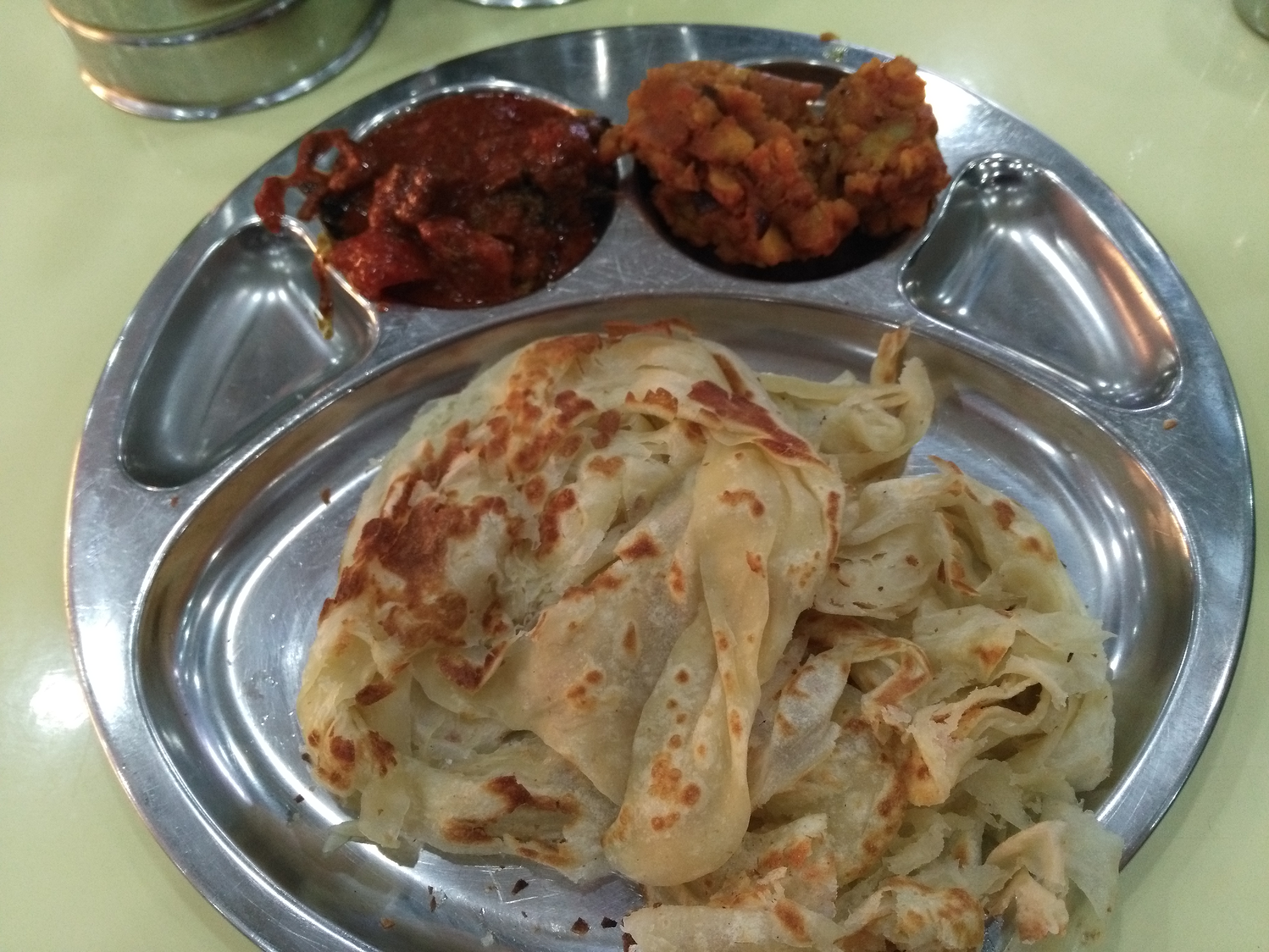 Roti chanai with goat curry and aloo gobi.
