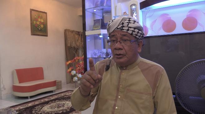 Ustaz Wahab during our interview.