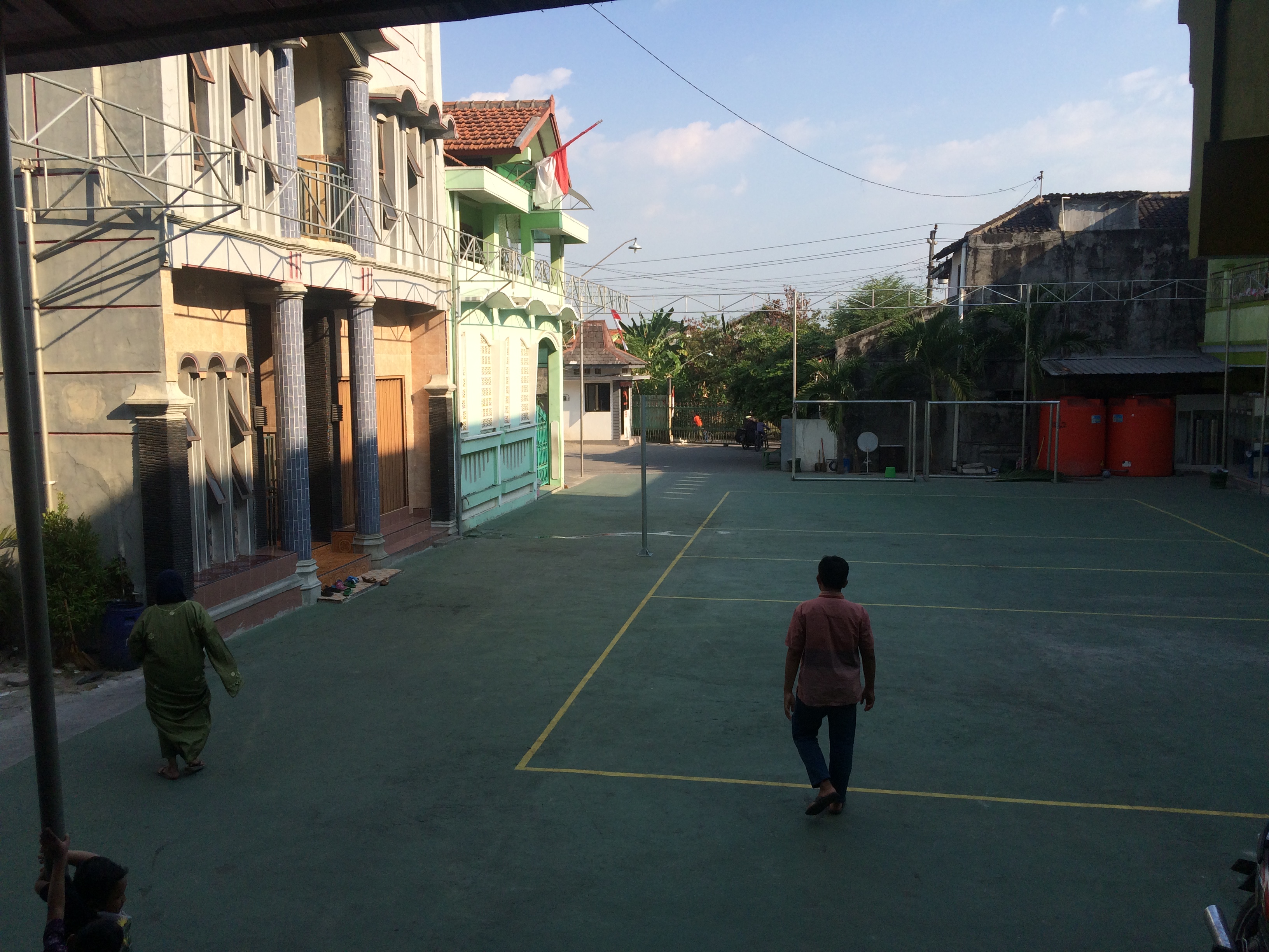 The pesantren courtyard. Note the volleyball court. . 