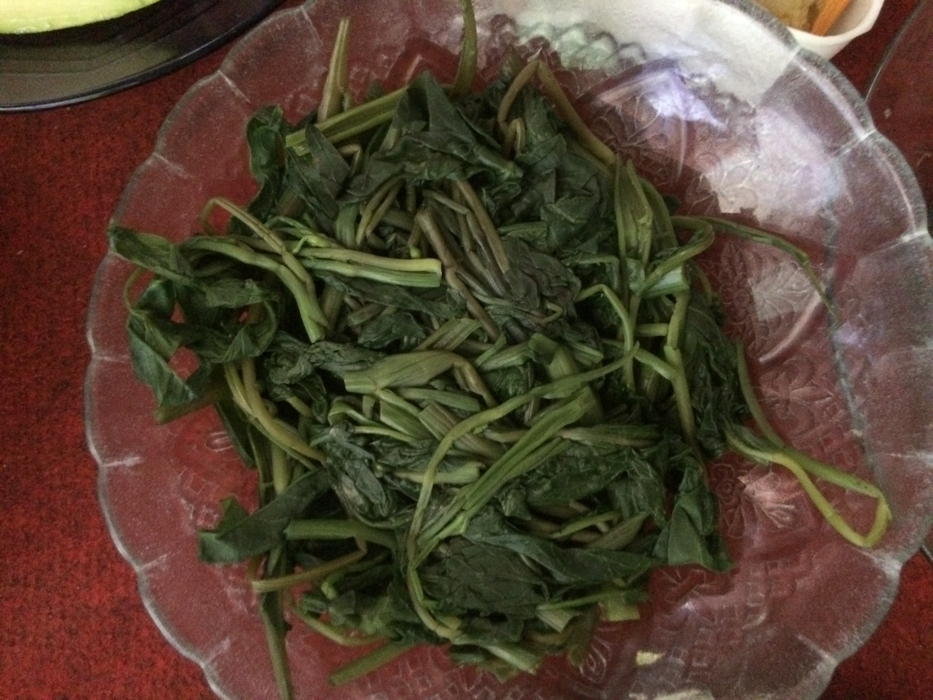 Cah kangkung (water spinach). Also highly common in Bengali cuisine.